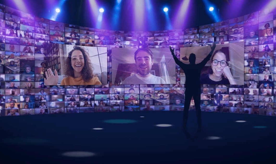 Mur géant de participants connectés en direct face à la scène